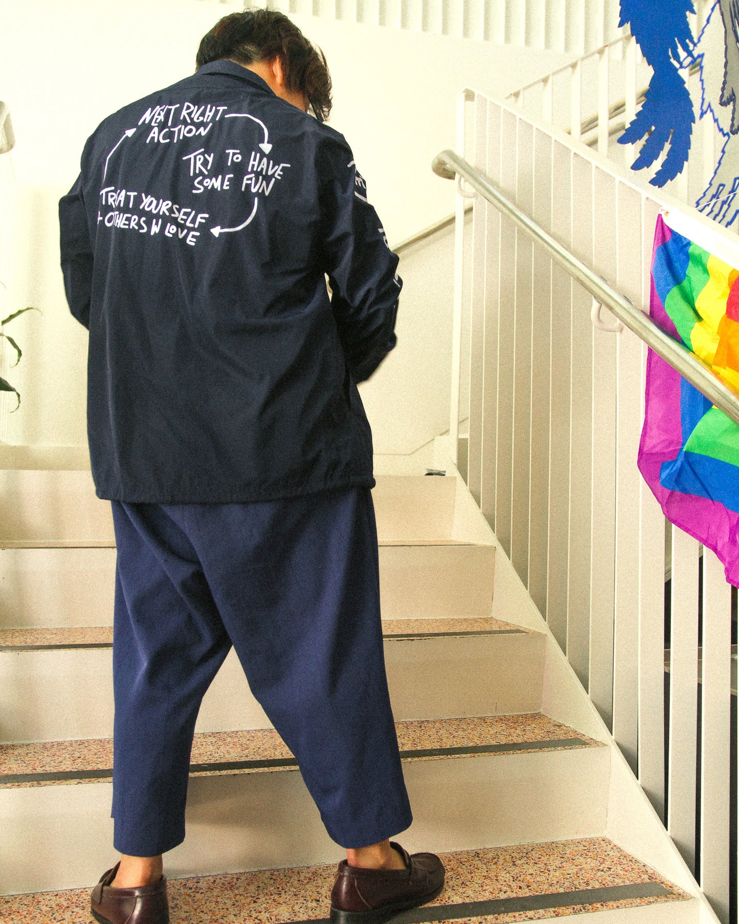 Navy Blue Keys To Life Coach's Jacket