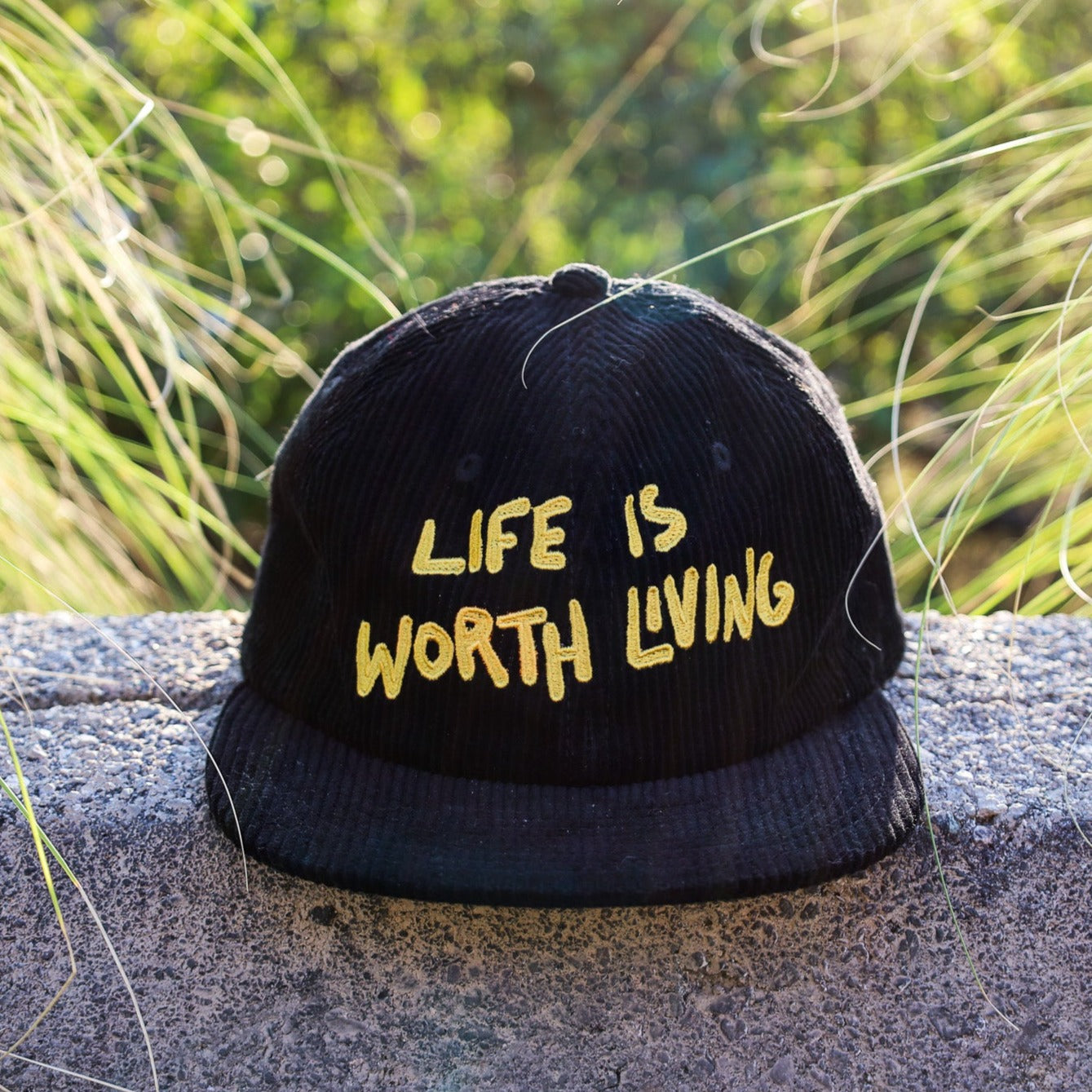 life is worth living corduroy cap